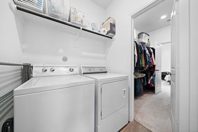 a utility room with dryer and washer