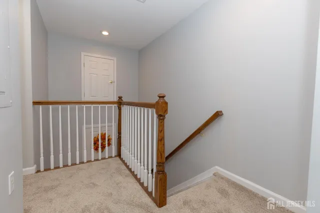 a view of a hallway with a window