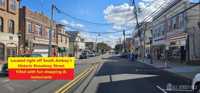 a sign on the side of a street