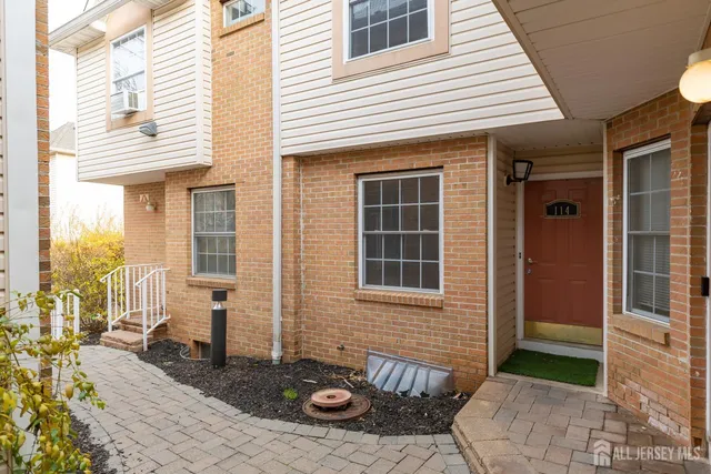 a view of a house with a lounge chair