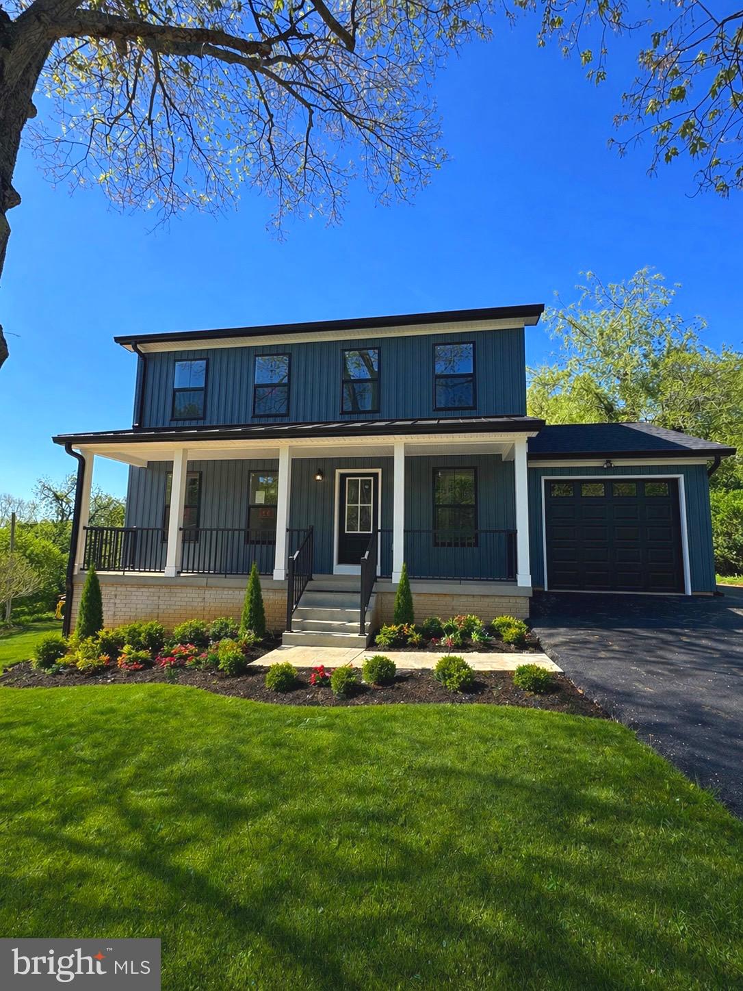 3706 South Mountain Road Knoxville, MD 21758 - Photo 1 of 12 a front view of a house with a yard