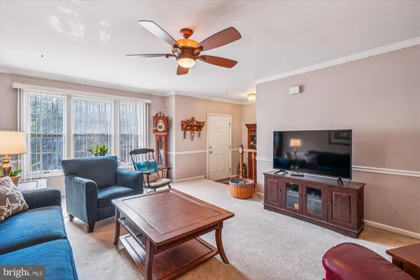 a kitchen with stainless steel appliances granite countertop a stove top oven a sink dishwasher and cabinets