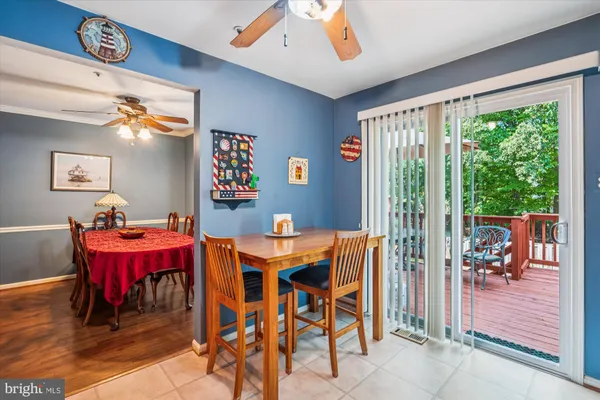 a large bedroom with a bed and a chandelier