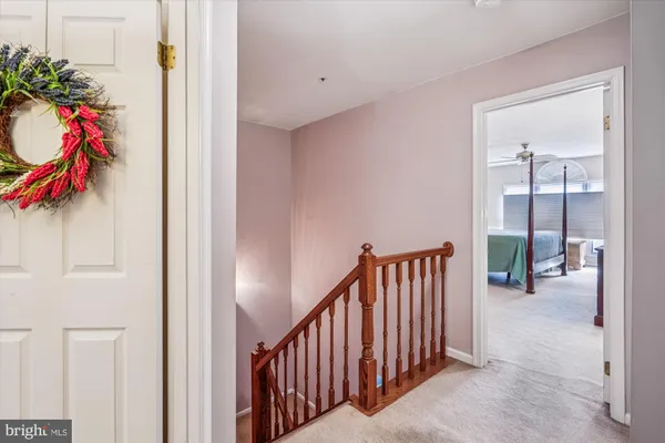 a bathroom with a sink toilet and shower curtain