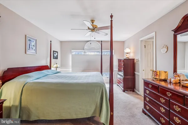 a room with furniture and a chandelier