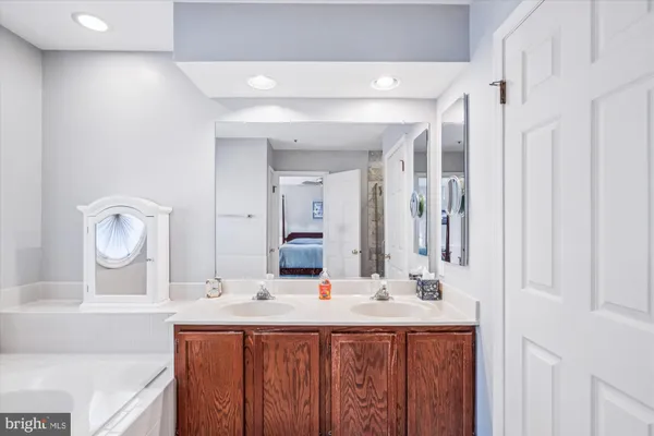 a workspace with furniture and a book shelf