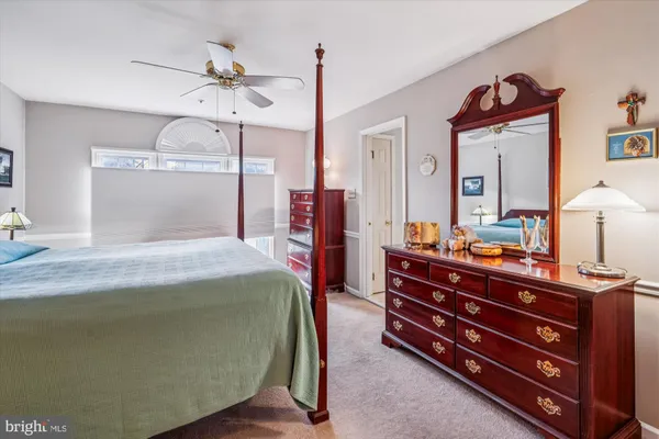 a front view of a house with a door and wooden floor
