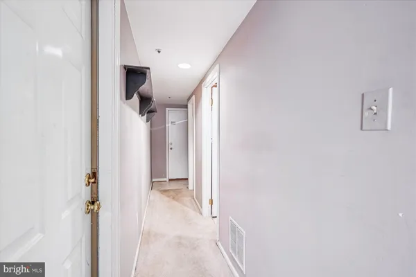 a view of a chairs and table in backyard