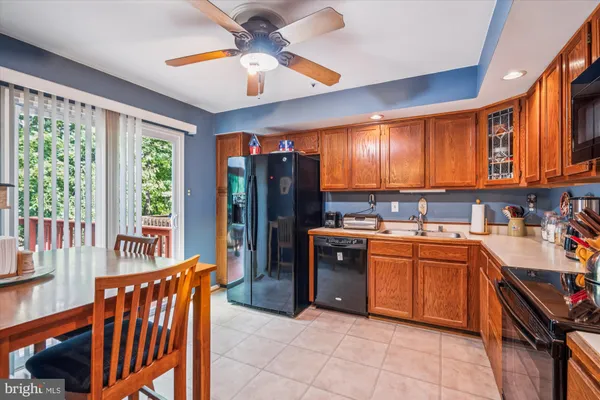 a view of balcony with wooden floor and outdoor seating