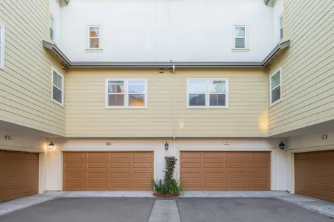 an aerial view of a pool patio patio and outdoor seating