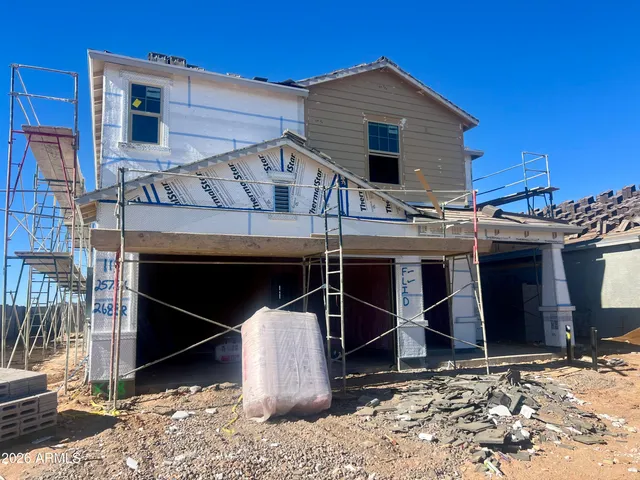 a view of a house with wooden floor and a window