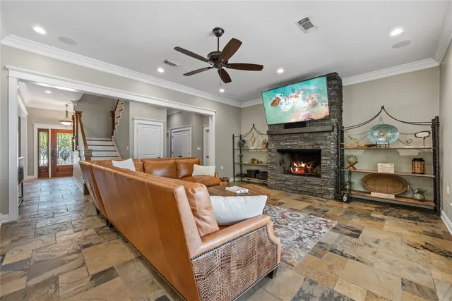 a large kitchen with a table and chairs