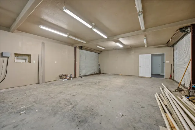a bathroom with a toilet sink vanity and mirror