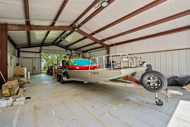 a view of a porch with chairs and backyard