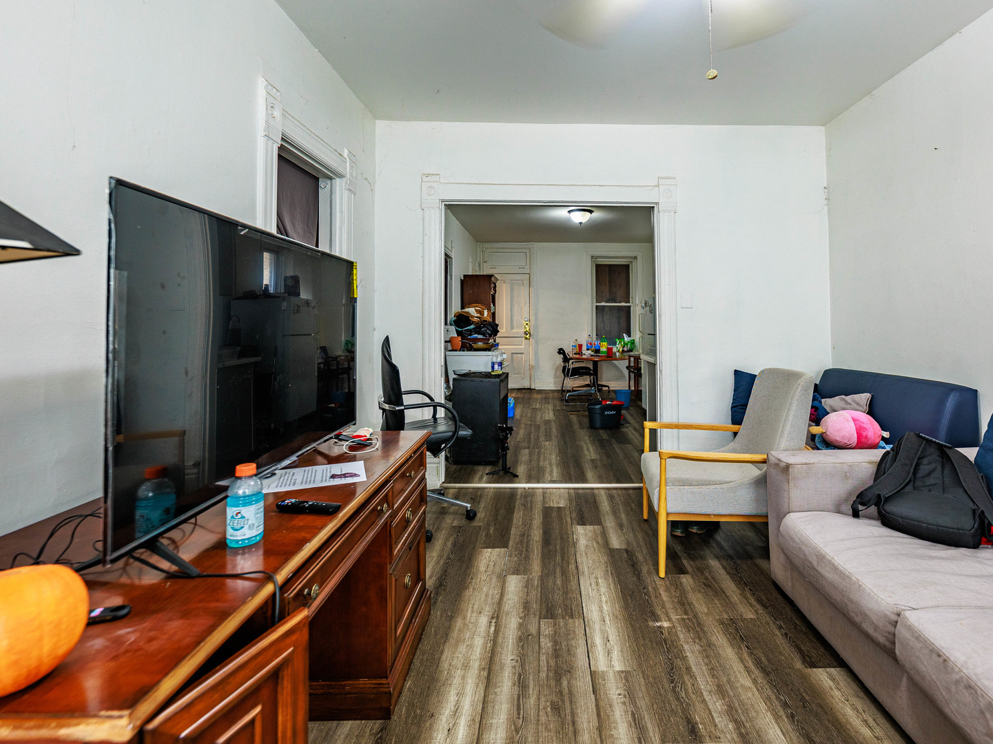 2016 West 22nd Place Chicago, IL 60608 - Photo 3 of 21 a living room with furniture and a flat screen tv