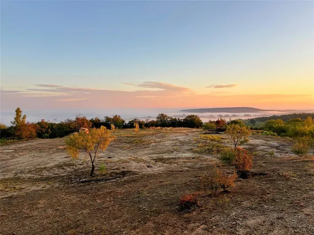 a view of an ocean with beach