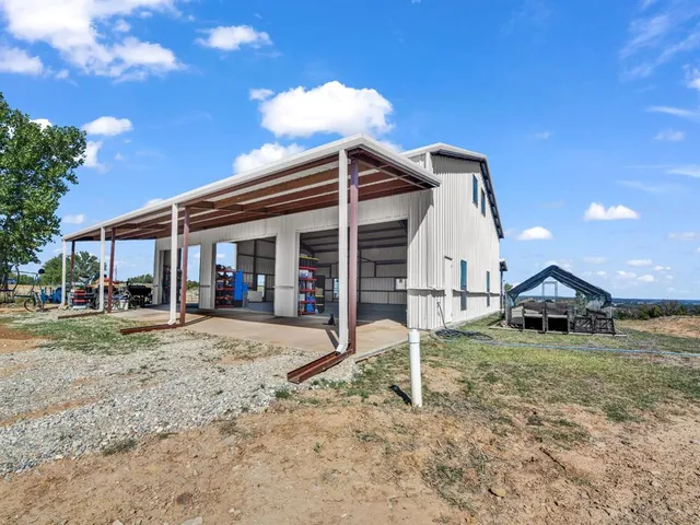 a front view of a house with patio