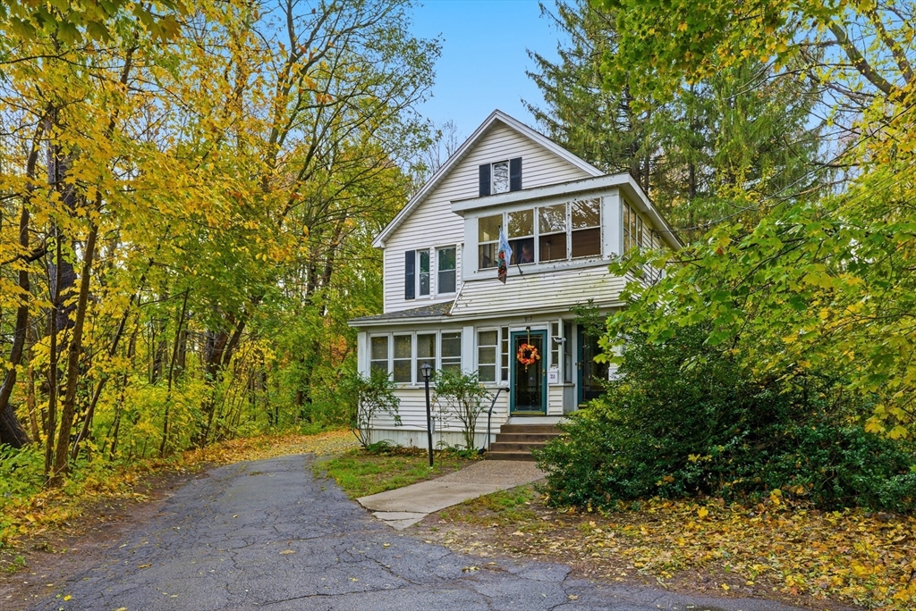 917 Elm Street West Springfield, MA 01089 - Photo 2 of 20 a front view of a house with garden
