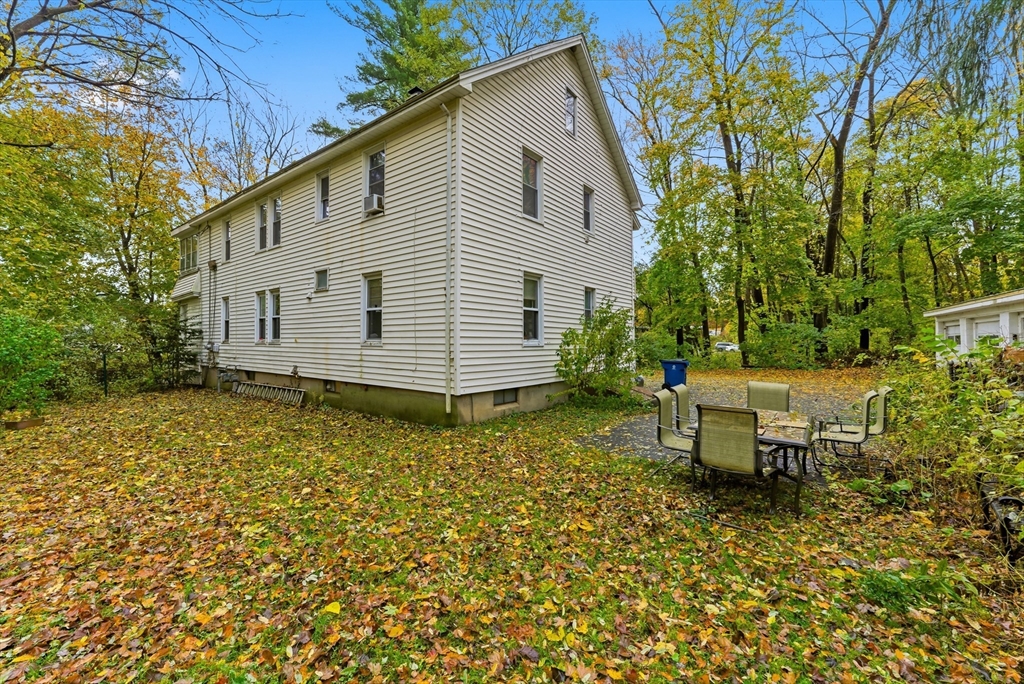 917 Elm Street West Springfield, MA 01089 - Photo 5 of 20 a view of a house with a yard and sitting area