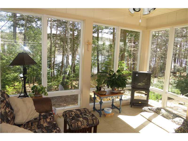 152 Peninsula Drive Rome, ME 04963 - Photo 12 of 29 Other. Comfortable sunroom with...