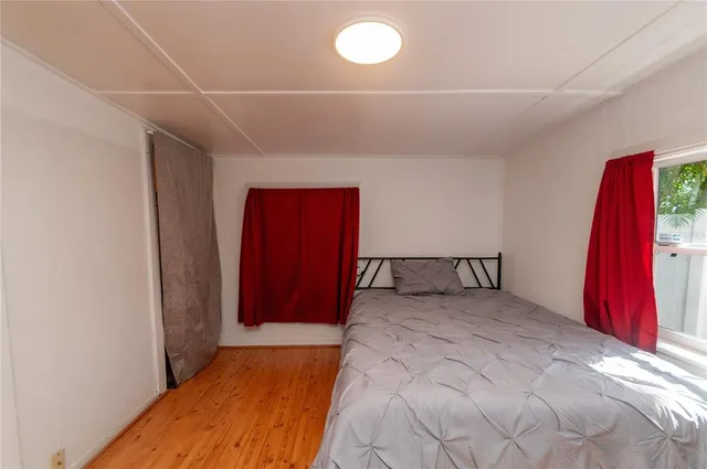 a view of a room with a furniture and entryway