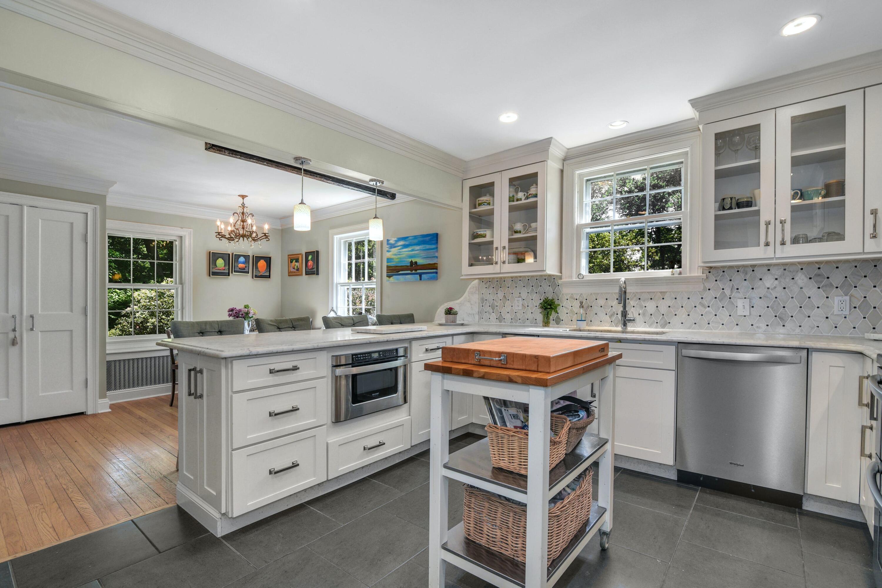 93 Westport Road Wilton, CT 06897 - Photo 11 of 31 a kitchen with stainless steel appliances granite countertop a stove and a sink