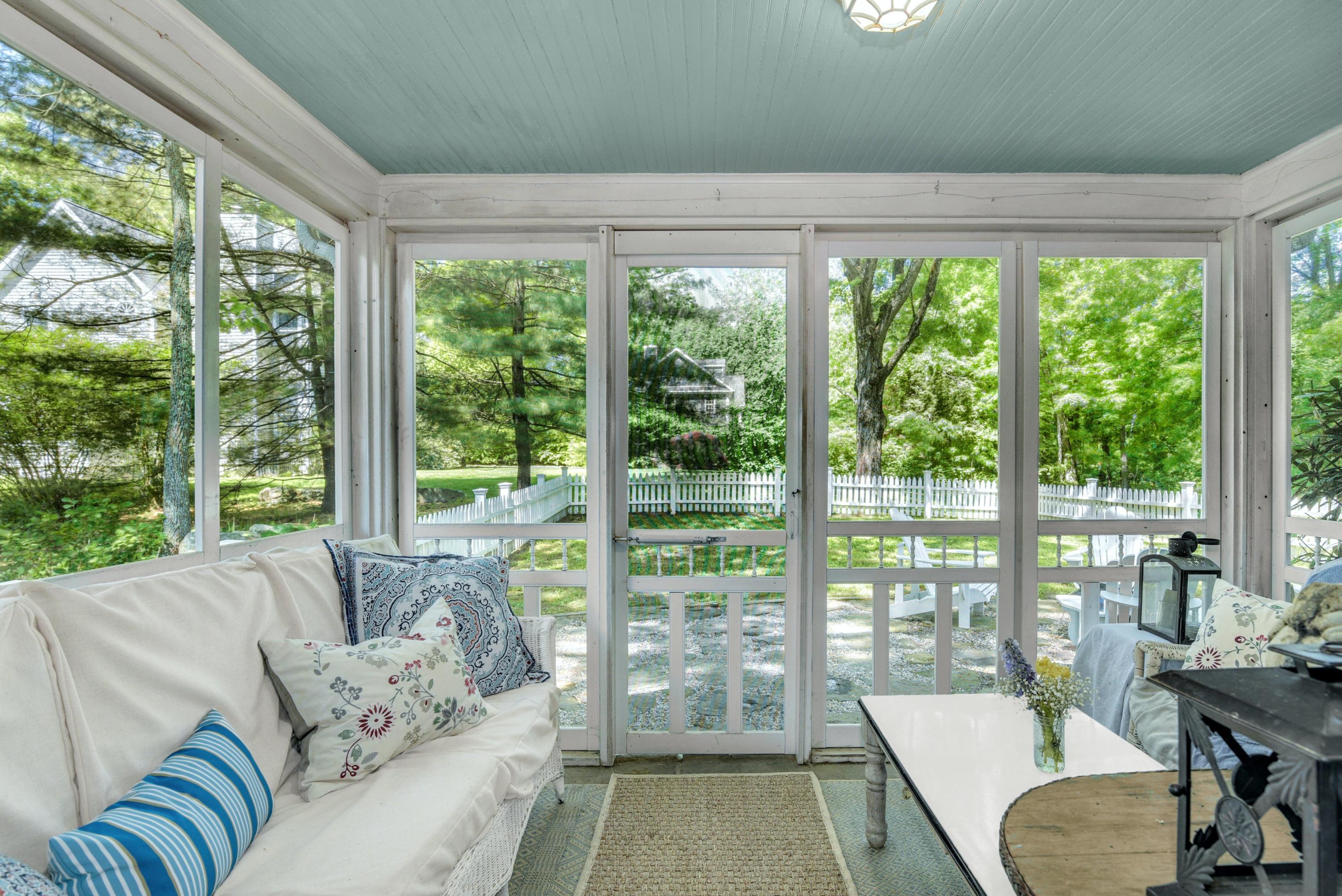 93 Westport Road Wilton, CT 06897 - Photo 13 of 31 a living room with furniture and a large window
