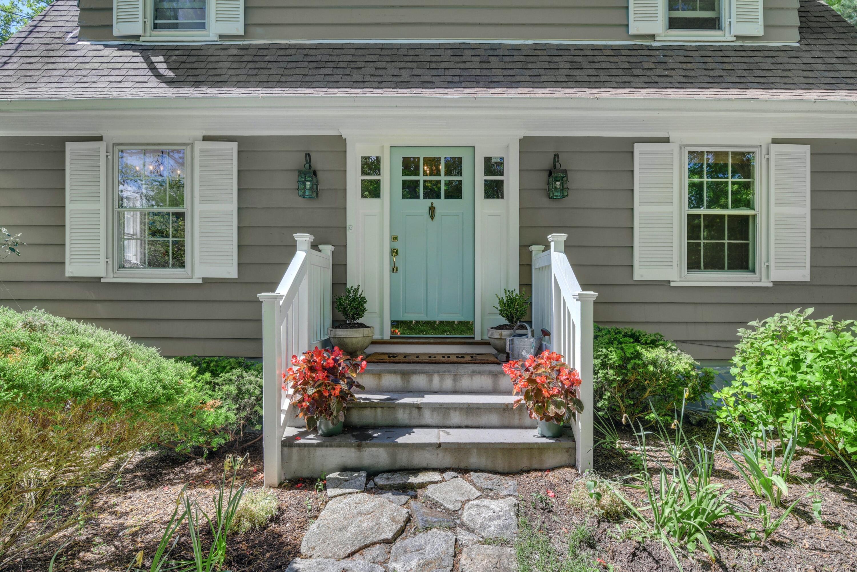 93 Westport Road Wilton, CT 06897 - Photo 3 of 31 a front view of a house with garden