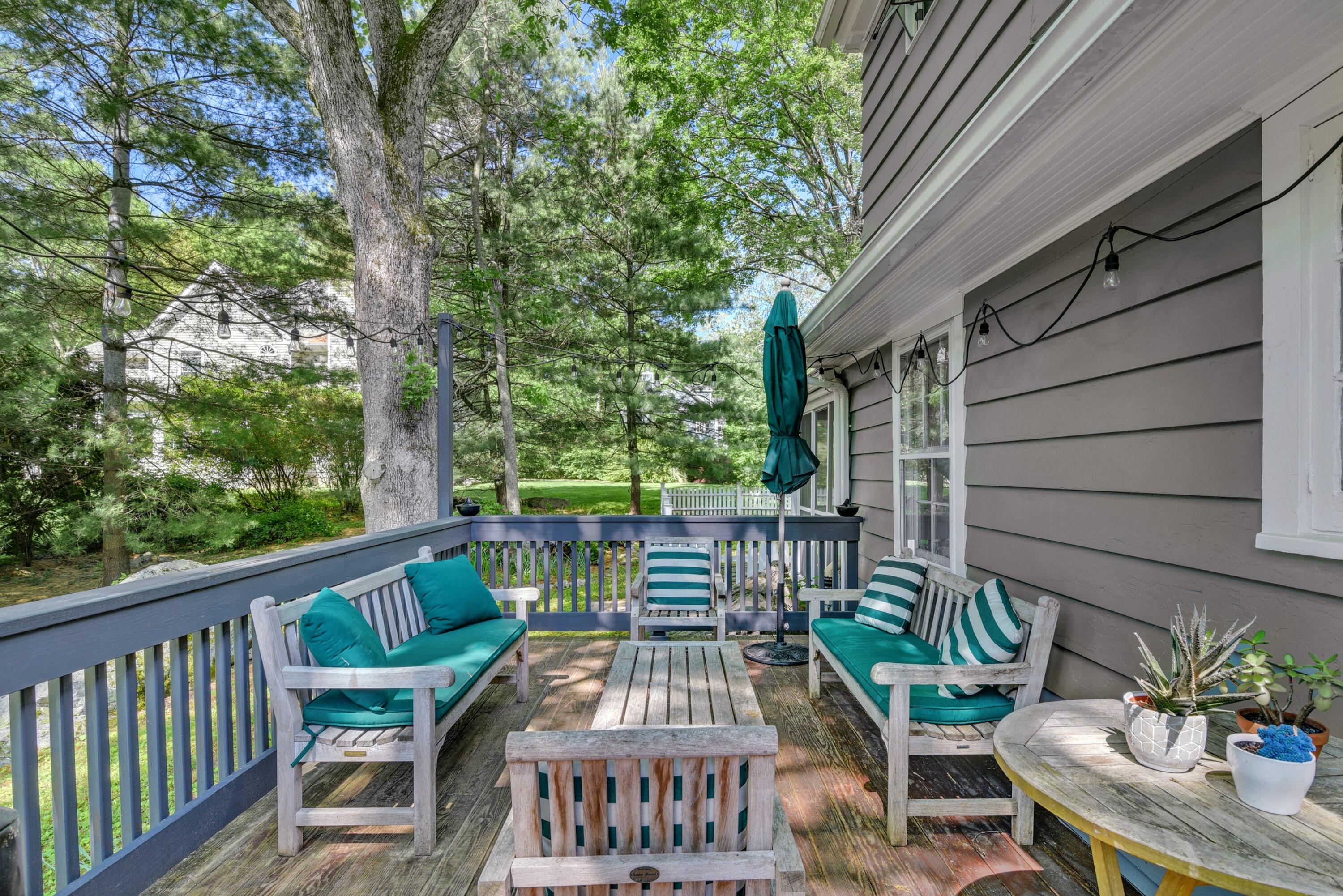 93 Westport Road Wilton, CT 06897 - Photo 21 of 31 a view of a patio with iron fence