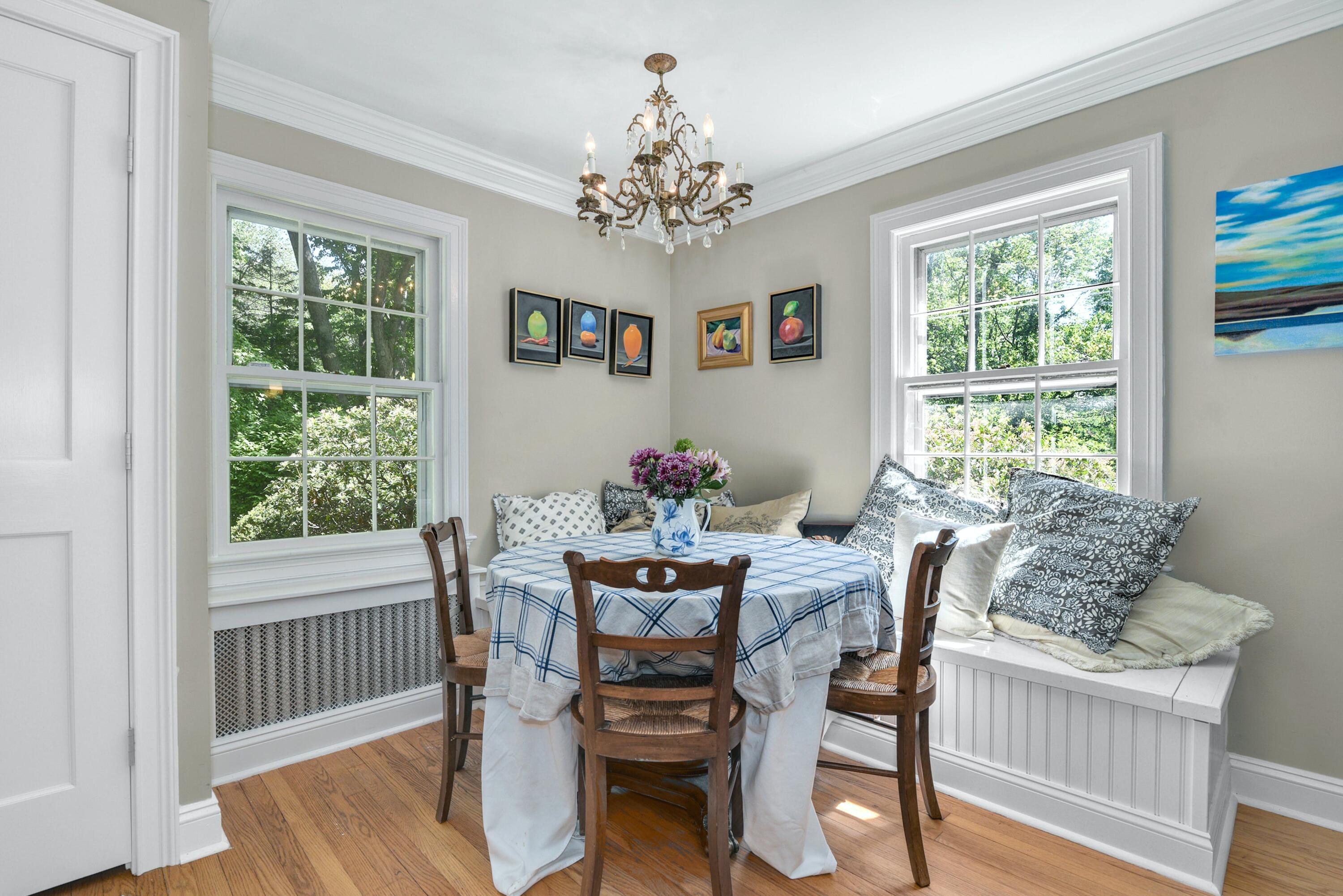 93 Westport Road Wilton, CT 06897 - Photo 7 of 31 a dining room with furniture a large window and wooden floor