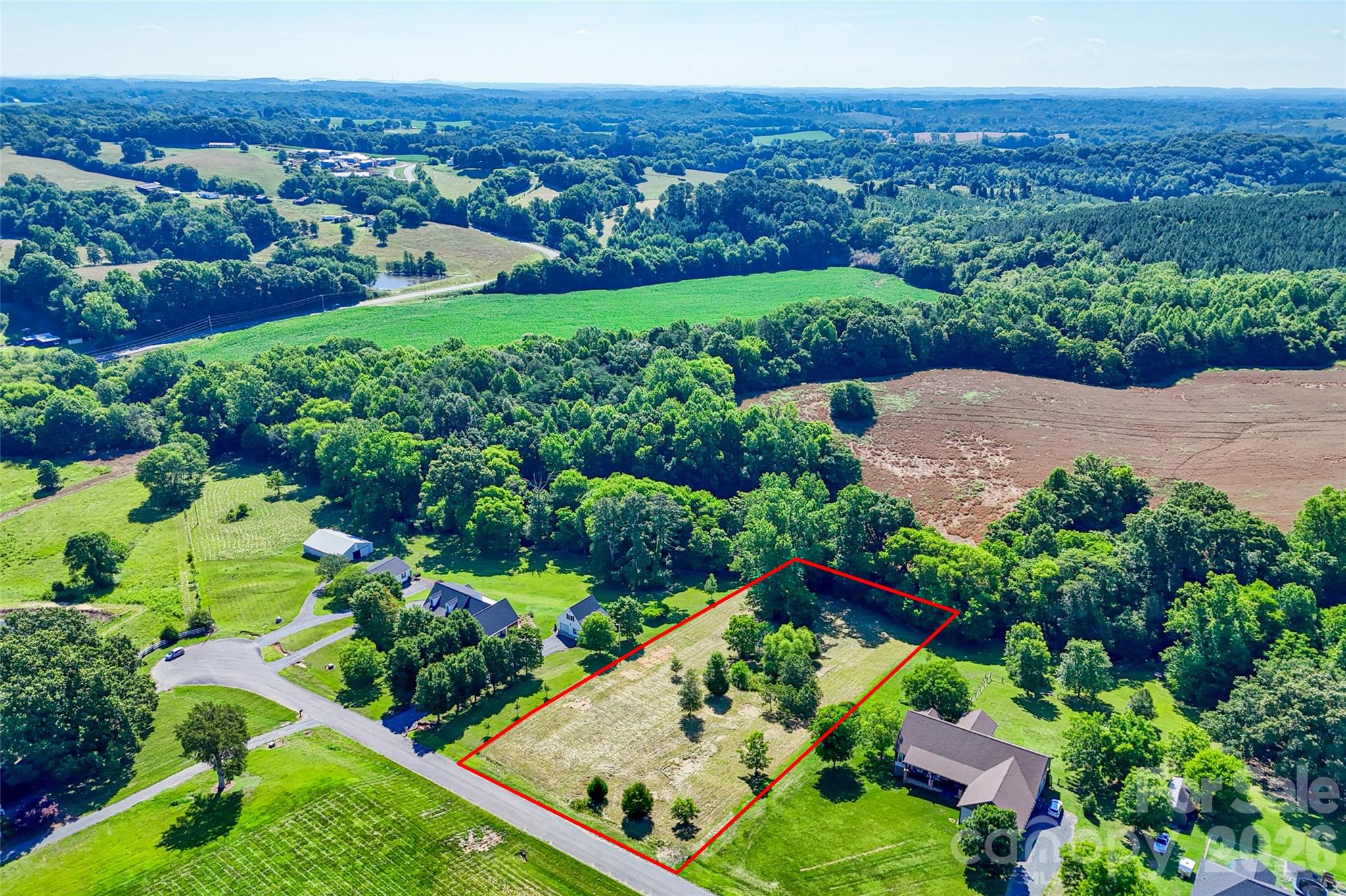 Lot 3 Crepts Branch Road, Unit 3 Locust, NC 28097 - Photo 23 of 36 an aerial view of a house with a garden