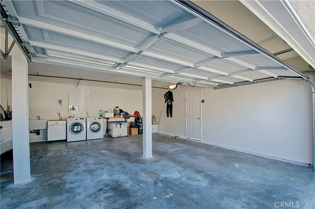 a utility room with washer and dryer