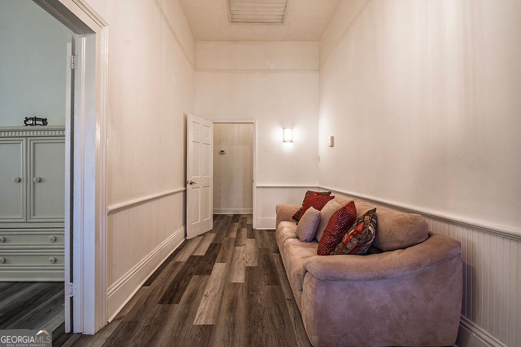 65 East Calhoun Street Wadley, GA 30477 - Photo 12 of 25 a living room with furniture and a rug