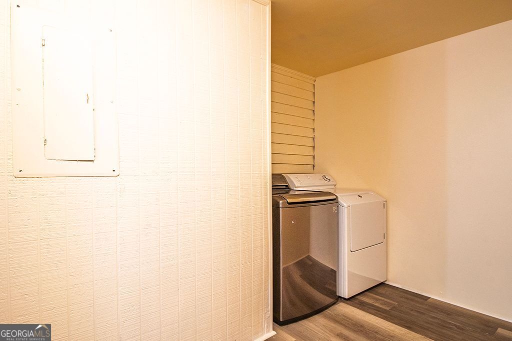 65 East Calhoun Street Wadley, GA 30477 - Photo 15 of 25 a kitchen with a refrigerator and cabinets