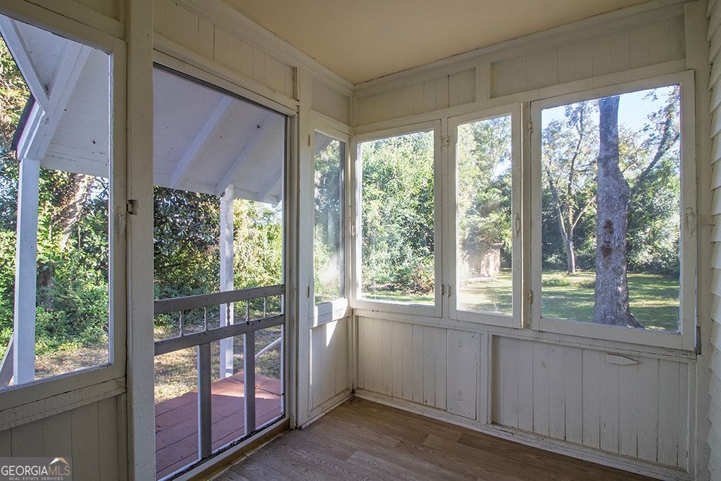 65 East Calhoun Street Wadley, GA 30477 - Photo 17 of 25 a view of an entryway with a lot of windows