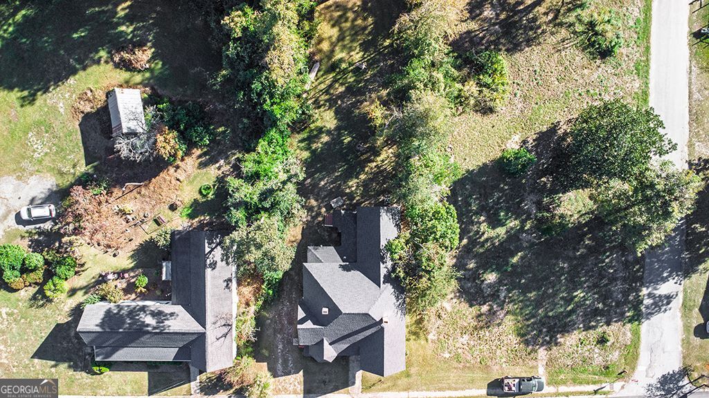 65 East Calhoun Street Wadley, GA 30477 - Photo 24 of 25 an aerial view of houses with yard