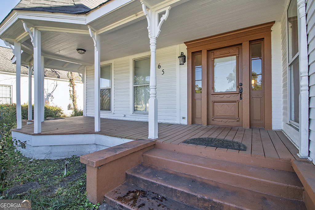 65 East Calhoun Street Wadley, GA 30477 - Photo 3 of 25 a house view with a outdoor space