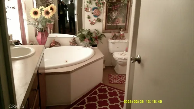 a bathroom with a sink and toilet