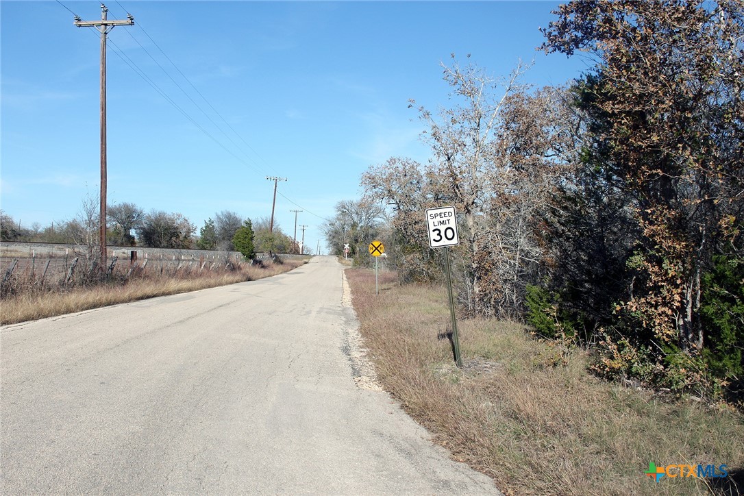 100 Track Road Dale, TX 78616 - Photo 12 of 12 a view of a road with a building in the background