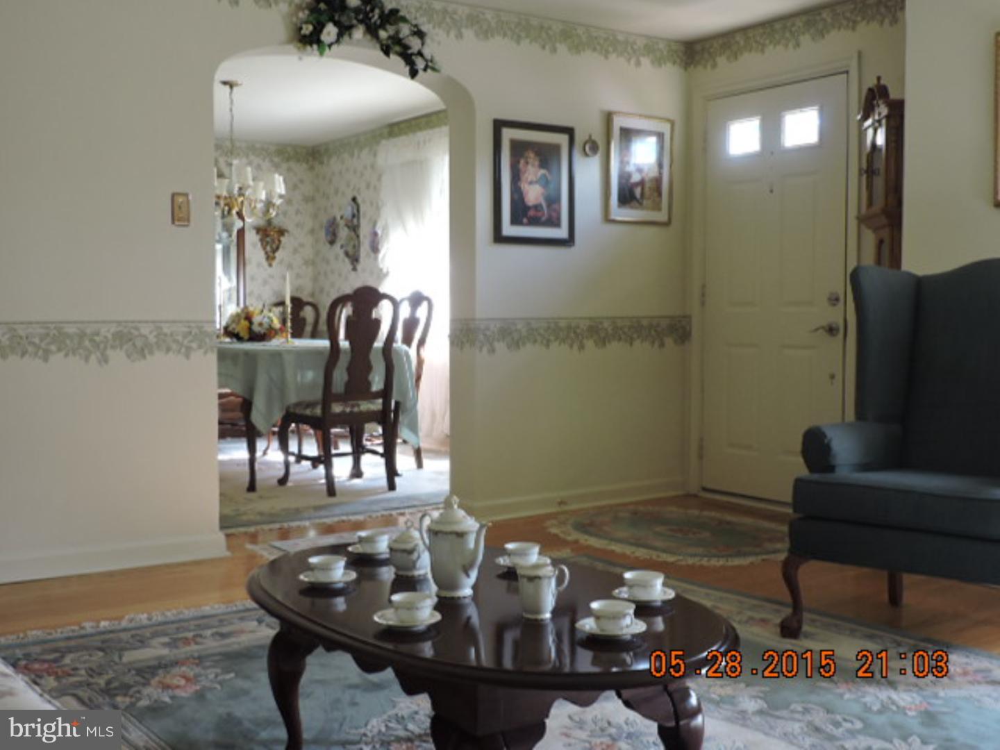 324 Gibbons Road Springfield, PA 19064 - Photo 8 of 25 a dining room with furniture and wooden floor