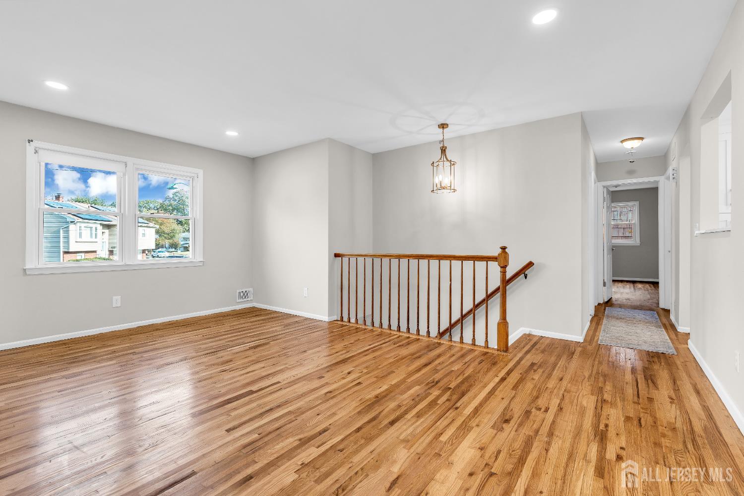 1322 Marcella Drive Union, NJ 07083 - Photo 12 of 48 a view of a room with wooden floor and window