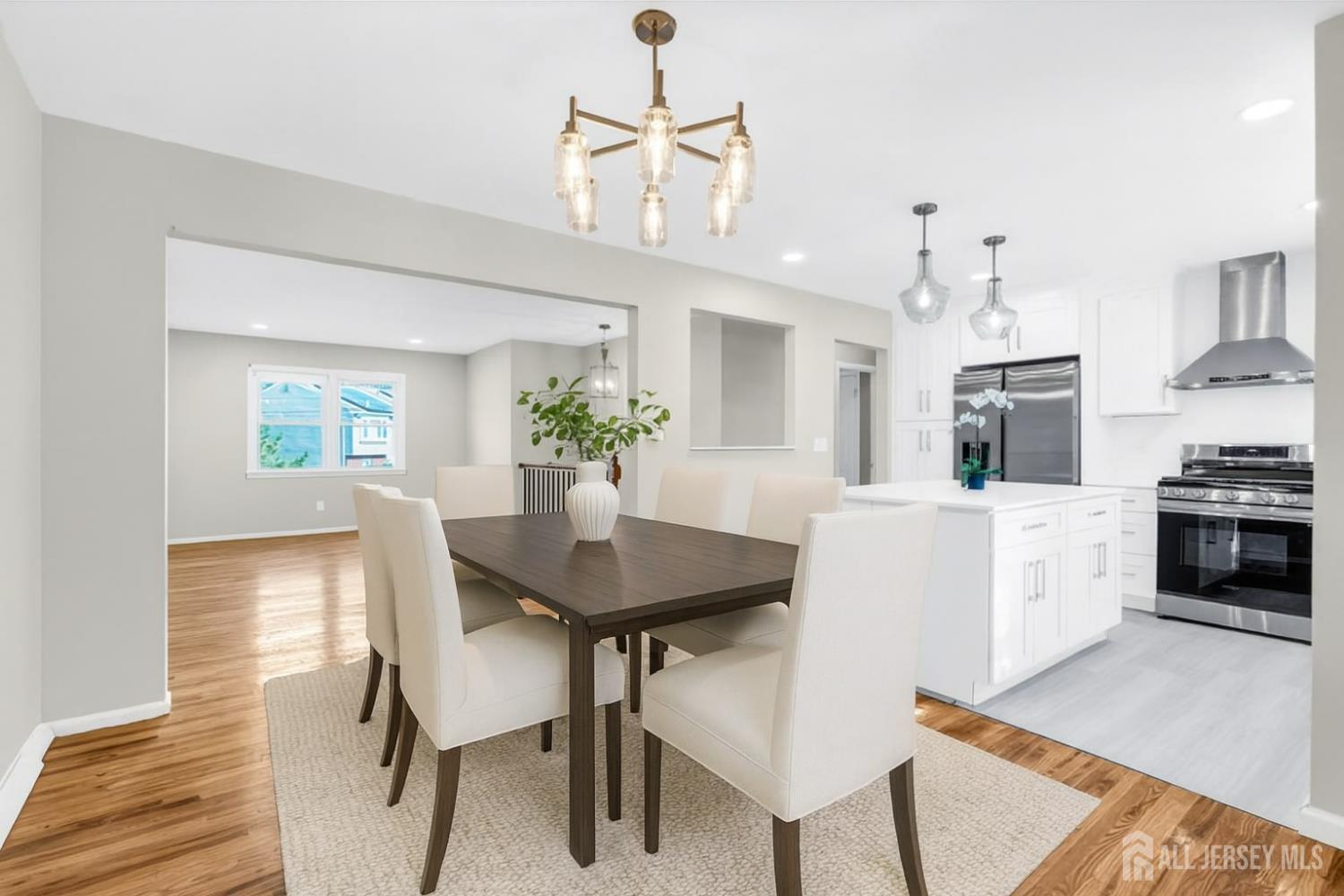 1322 Marcella Drive Union, NJ 07083 - Photo 15 of 48 a view of a dining room with furniture and wooden floor