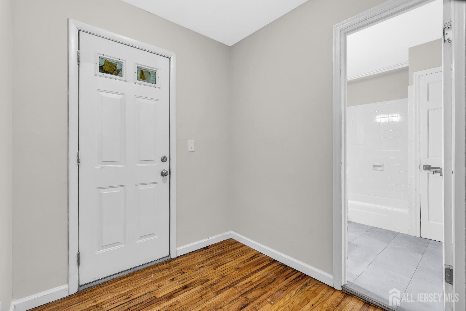 1322 Marcella Drive Union, NJ 07083 - Photo 32 of 48 a view of a hallway with wooden floor