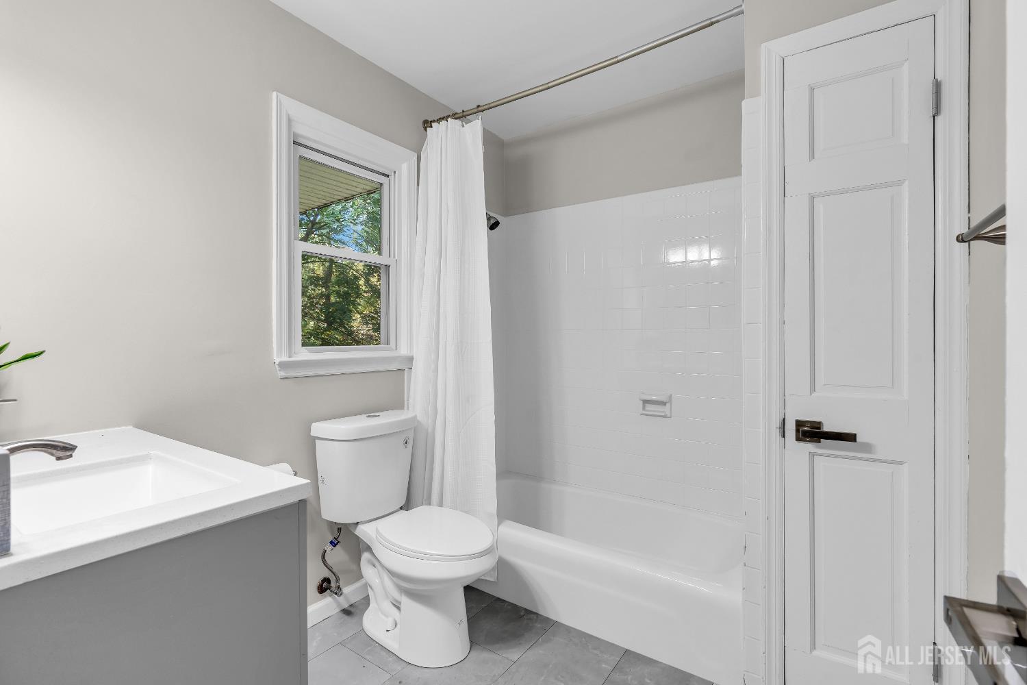 1322 Marcella Drive Union, NJ 07083 - Photo 33 of 48 a bathroom with a toilet a sink and shower