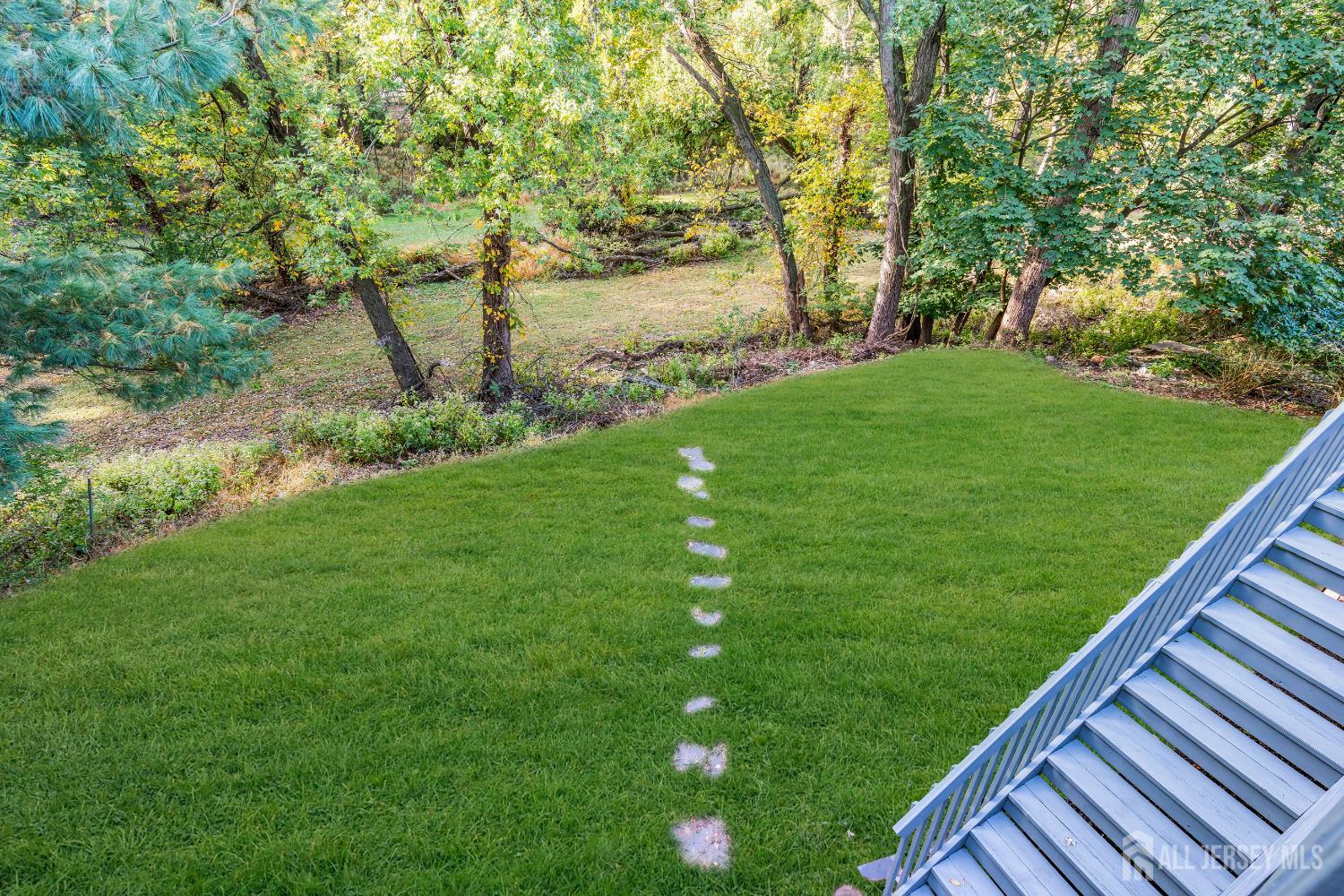 1322 Marcella Drive Union, NJ 07083 - Photo 43 of 48 a view of a backyard with a garden