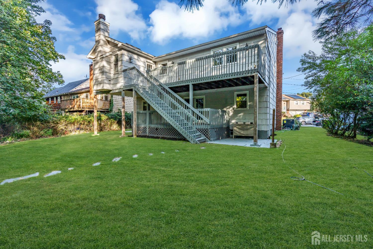 1322 Marcella Drive Union, NJ 07083 - Photo 47 of 48 a front view of house with a garden