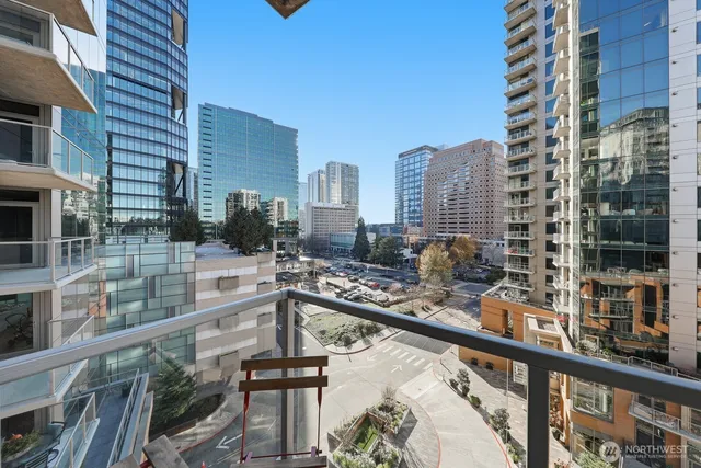 a city view from a balcony with patio