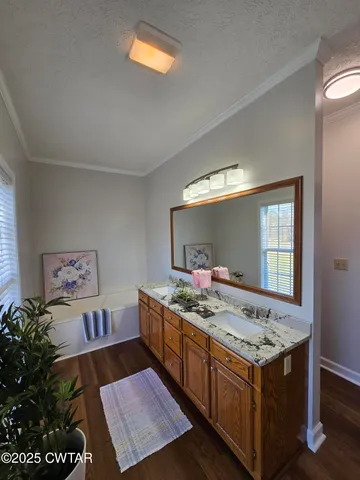 a view of kitchen island with wooden floor