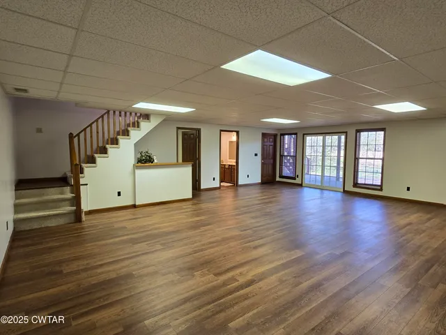 a view of a livingroom with wooden floor