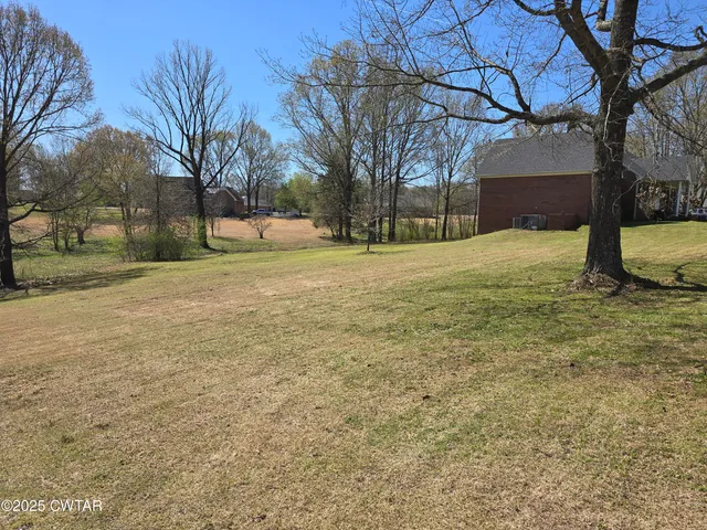 a house with yard in front of it